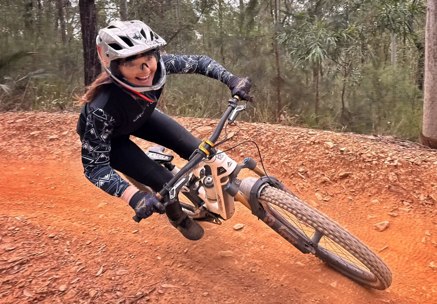 girl riding a mountain bike in CROFTO Mozaic MTB jersey