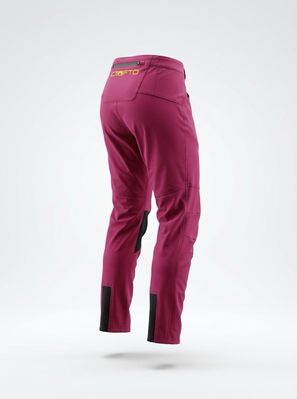 Back view of CROFTO Amaroo Lite MTB Pants in maroon, lightweight mountain bike pants with tapered legs, rear pocket detail and black stretch panels designed for trail and enduro riding.