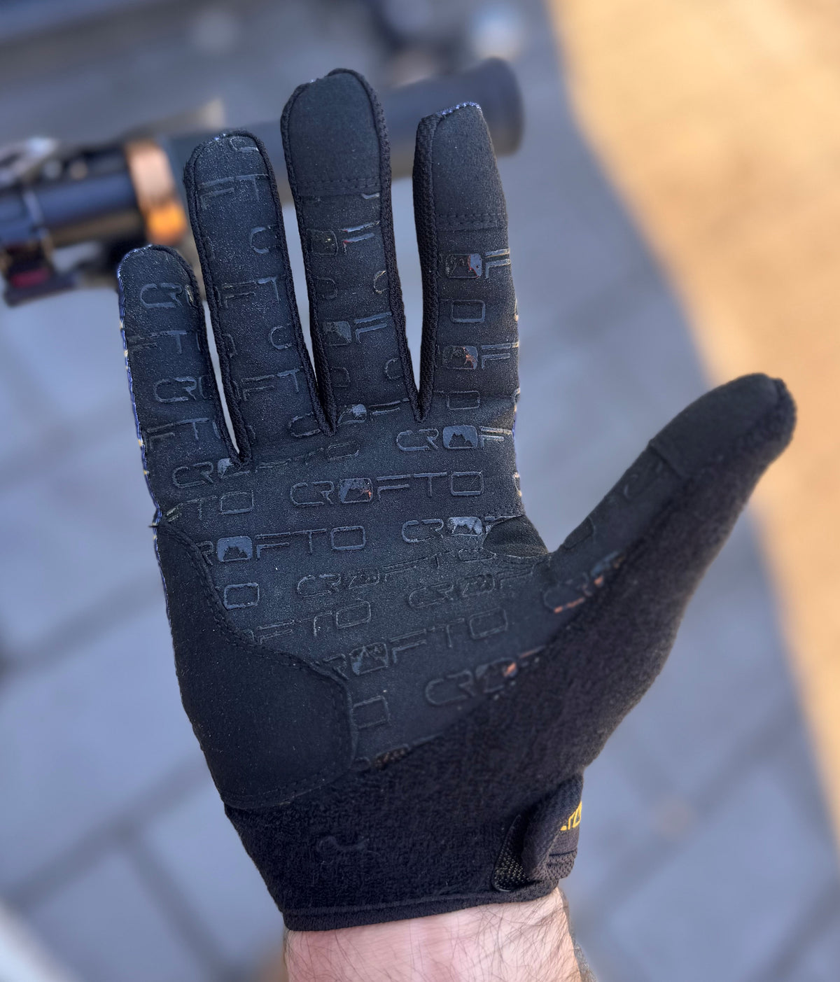Close up of the palm crofto Apex pro MTB gloves showing silicone crofto logo grip