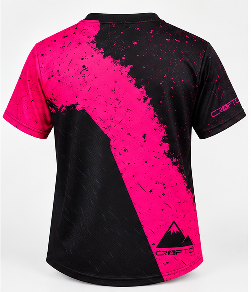 Rear view of the CROFTO Havoc MTB Jersey showcasing bold black and hot pink graphics and relaxed MTB fit.