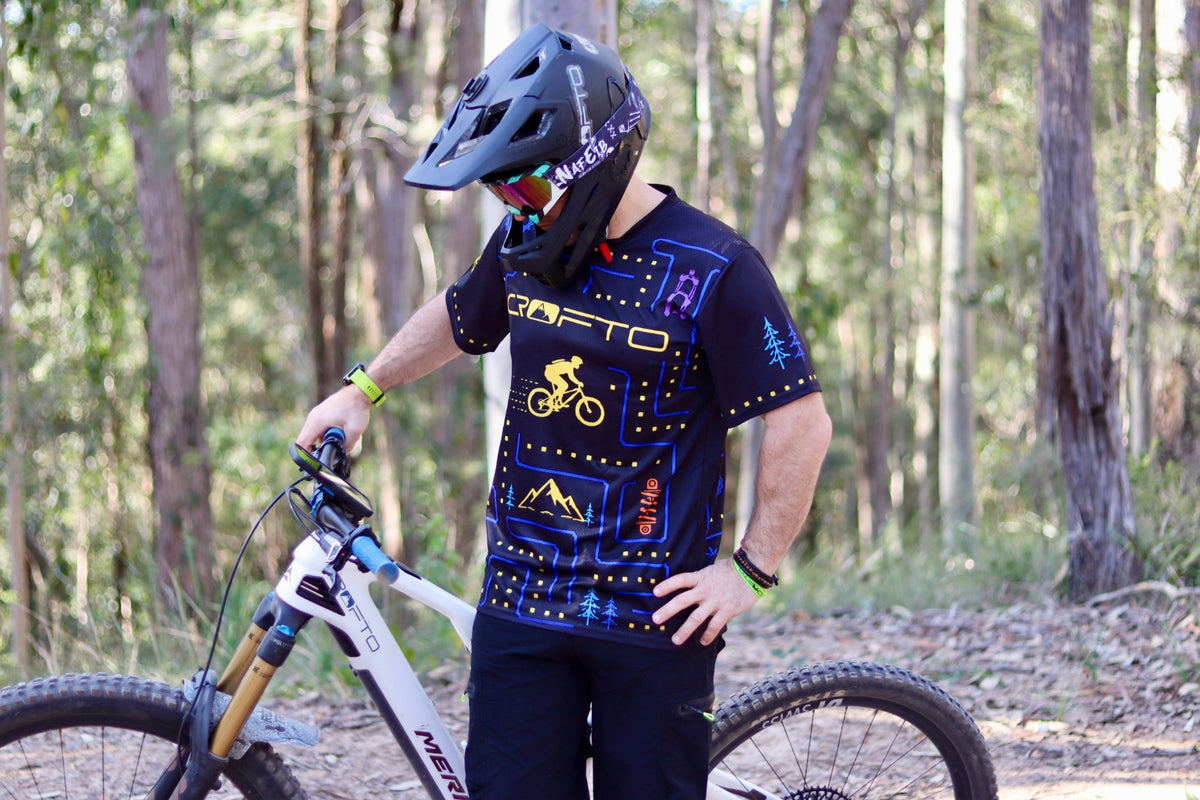 Front view of the CROFTO Trail Maze mountain bike jersey featuring retro gaming maze graphics and mountain bike themed artwork.