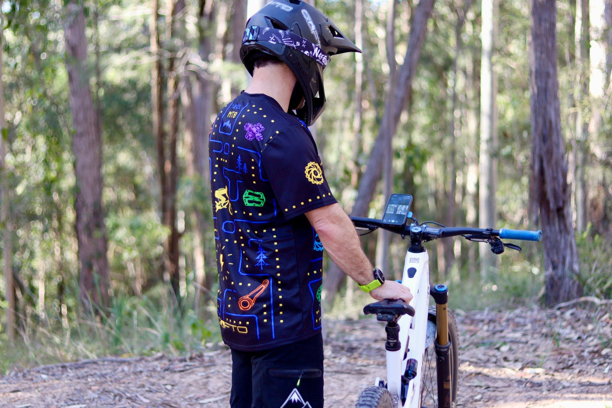Back view of the CROFTO Trail Maze mountain bike jersey featuring retro gaming maze graphics and mountain bike themed artwork.