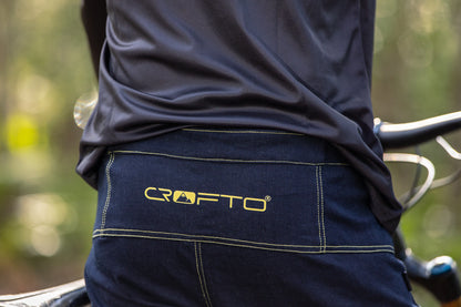 Close up of the back waistband of CROFTO Denim MTB Jorts showing navy shorts with gold CROFTO logo and stitching