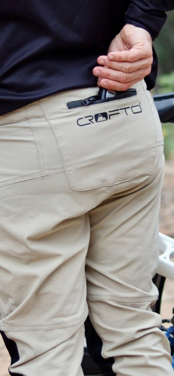 close up of back pocket on CROFTO Amaroo pants in sand