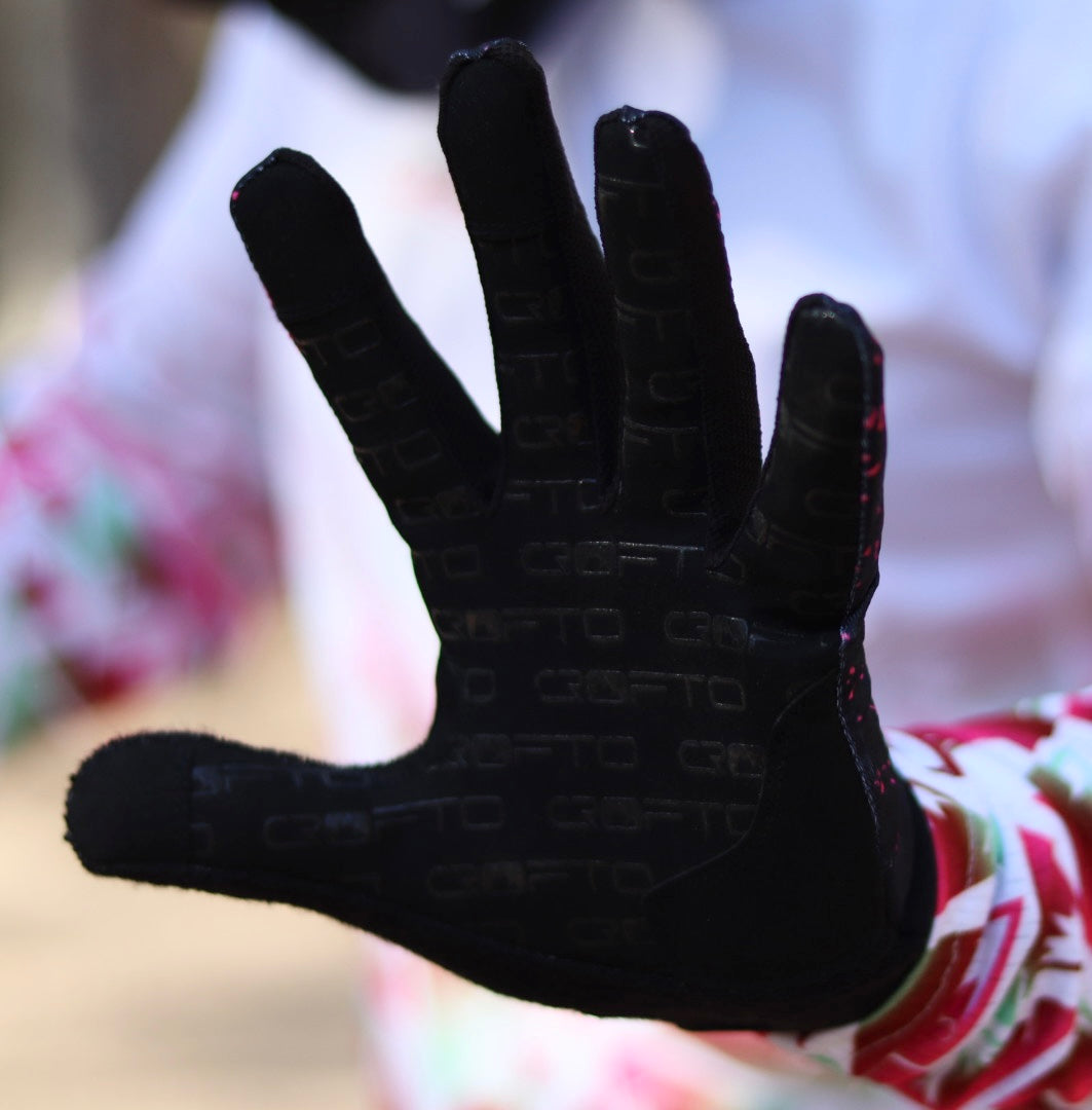 Close up of palm view of CROFTO Apex pro MTB gloves in black and hot pink