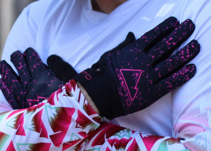 Pair of CROFTO Apex Pro MTB gloves in hot pink showing the lightweight upper material, breathable construction and rider-focused fit.