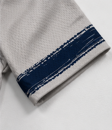 Close-up arm graphic detail of the CROFTO Trackline MTB Jersey featuring flowing brush-stroke artwork 