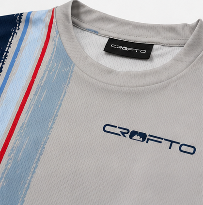 Close-up of CROFTO Trackline MTB Jersey showcasing breathable fabric, relaxed fit and bold vertical stripe design.