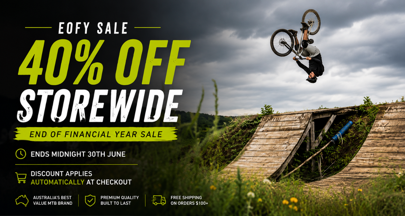 End of Financial Year sale advertisement with a biker performing a trick on a wooden ramp.